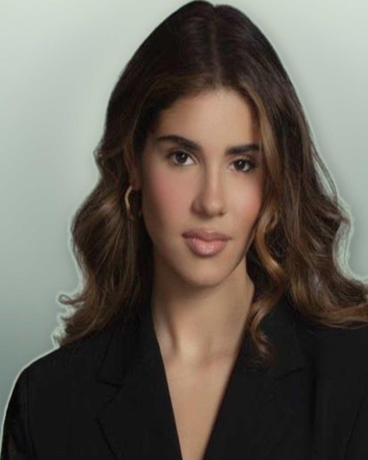 Julia Hatoum — studio portrait in a tailored blazer