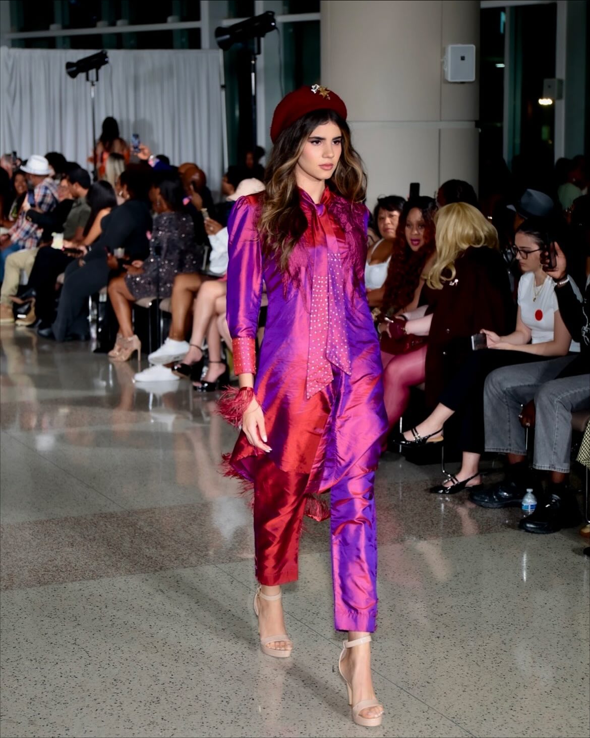 Runway — confident stride, full look visible